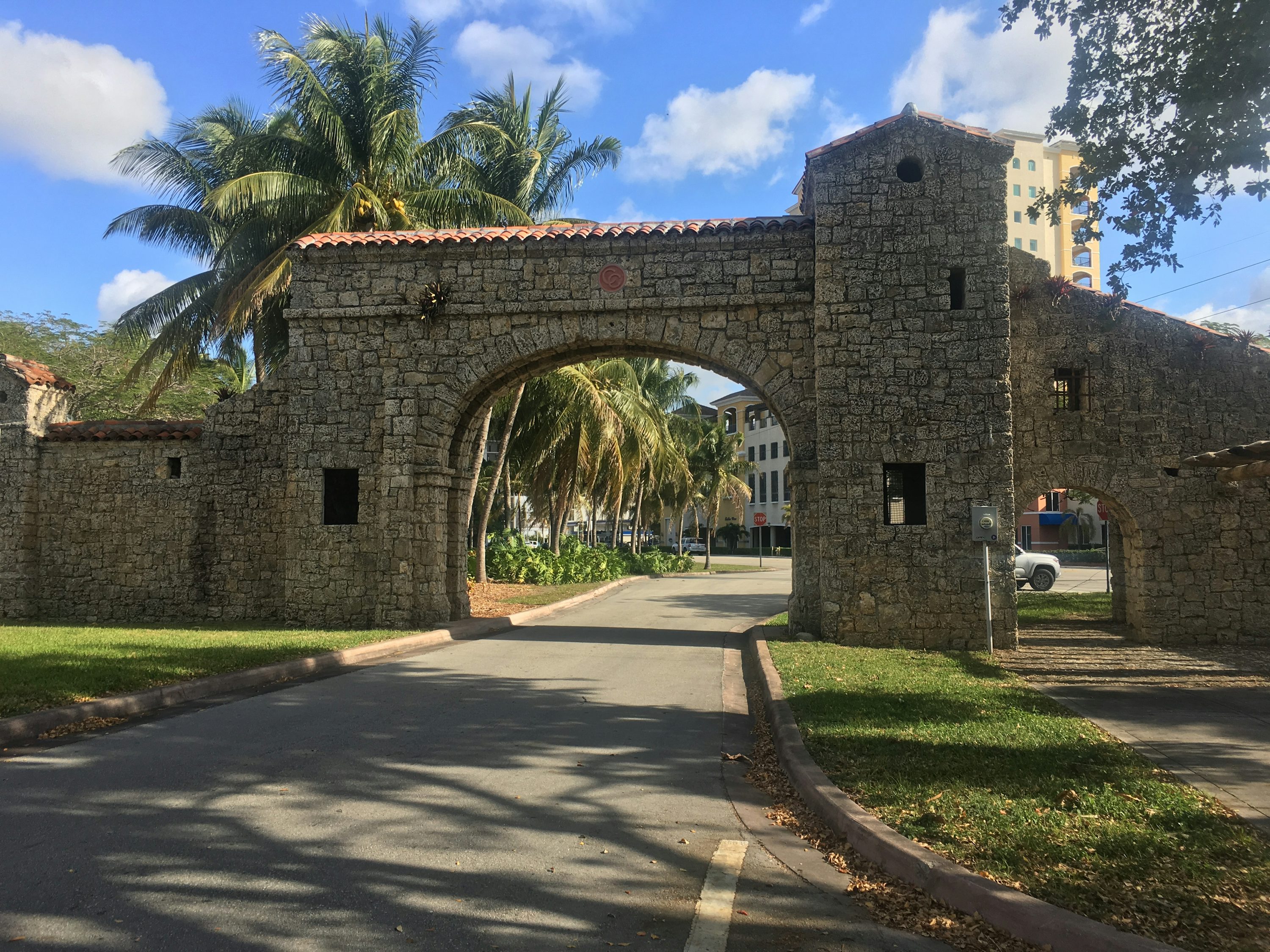 Coral Gables’ historic stone gateway framed by palms